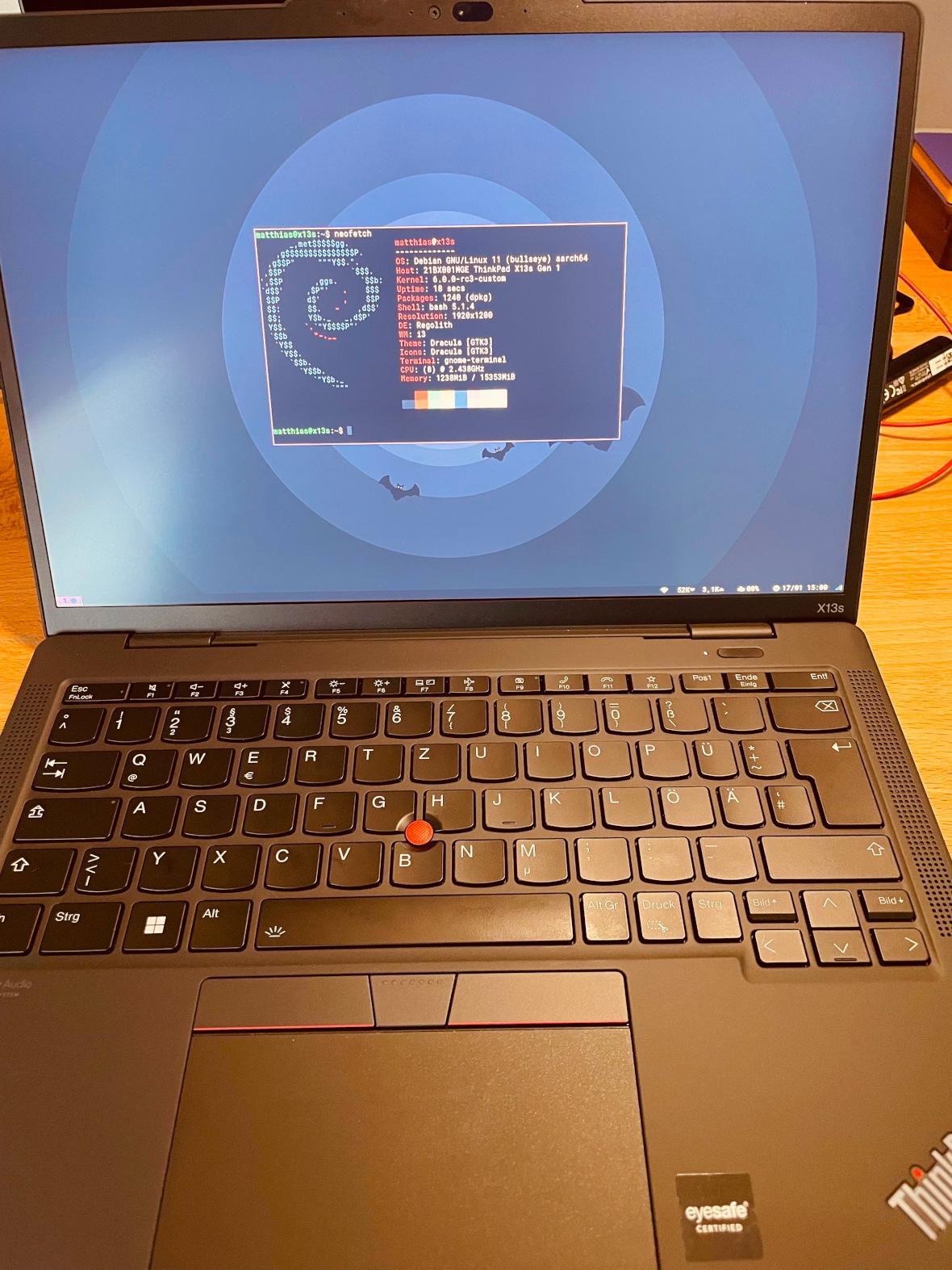ThinkPad X13s Gen 1 running Debian 11, Regolith-Desktop w/ Dracula look and neofetch
